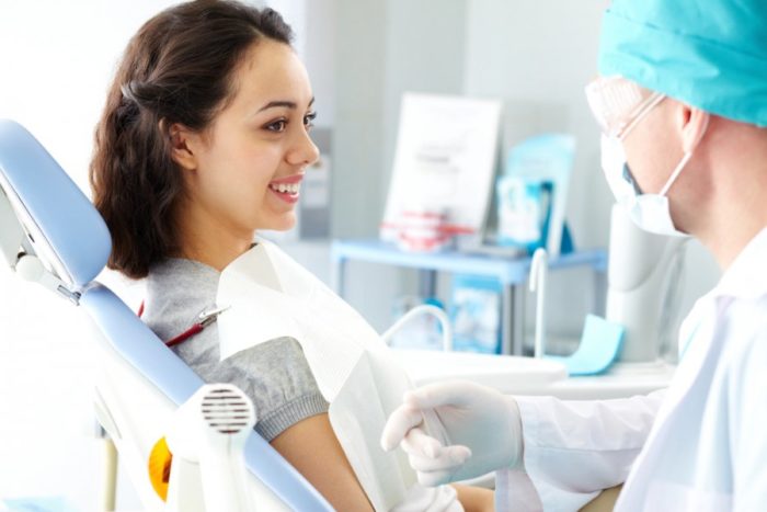 Dentist with patient